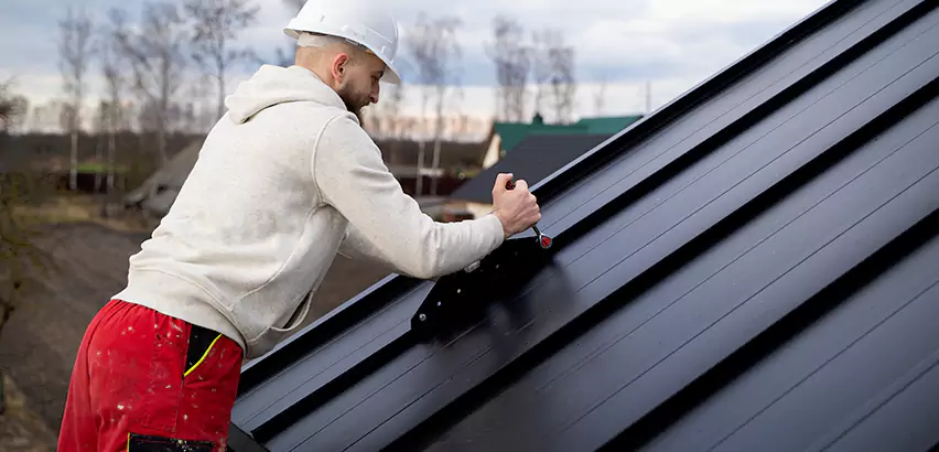 Tin Roof Ridge Cap Installation in Eastchester